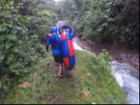        Walking Along The Blue River To Start Tubing
  - Costa Rica