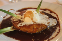        grilled pineapple with caramel sauce casa esmeralda 
  - Costa Rica
