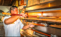        Pizza Mail It Putting The Dough In The Oven
  - Costa Rica