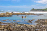        Playa Pelada Tide Pool Dad And Son Playing
  - Costa Rica