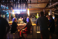       gusto bar beach at night 
  - Costa Rica