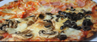        combination pizza closeup
  - Costa Rica