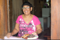        Victoria On The Window Showing Her Gallo Pinto
  - Costa Rica