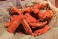        lazy mon buffalo wings 
  - Costa Rica