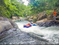        Sliding On Rock Surfaces Rio Negro Tubing Rincon De La Vieja
  - Costa Rica