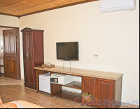        Standard Room Tv Fridge And Other Amenities Los Lagos Hotel Resort And Spa
  - Costa Rica