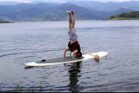        sup lake arenal headstand 
  - Costa Rica