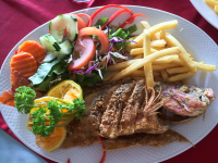        whole fried fish el ancla 
  - Costa Rica