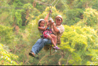        Young Girl Riding With A Guide Tizati Zip Line Rincon De La Vieja
  - Costa Rica