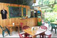        chicken joes tables wideshot 
  - Costa Rica