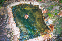        Lady Soaking On A Warm Cement Pool Hot Springs Pools Rincon De La Vieja
  - Costa Rica