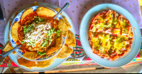        Shredded Beef Nachos And Pizza Ariel View Osa Palmas Restaurant
  - Costa Rica