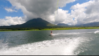        a lady watersking on lake arenal
  - Costa Rica