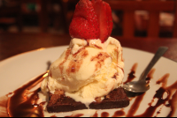        Brownie Topped With Ice Cream At Burger Rancho
  - Costa Rica