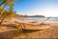        Fishing Boat On The Sand Of Playa Pelada In Nosara
  - Costa Rica