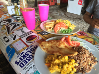        casado and rice on surfboard table
  - Costa Rica