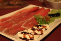        speck and goat cheese with balsamic reduction 
  - Costa Rica