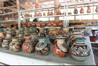        shelves of pottery willys guaitil 
  - Costa Rica