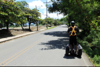        segway tour on the road 
  - Costa Rica