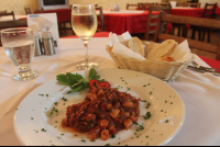        italian style octopus bread and wine casa esmeralda 
  - Costa Rica