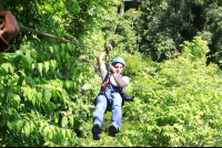        Man Ziplining On Suntrails Canopy Tour
  - Costa Rica