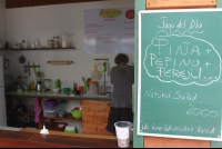        juice of the day sign falafel cafe 
  - Costa Rica