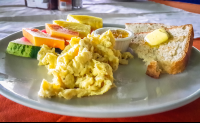        Scramble Eggs With Fruits At La Leona Lodge
  - Costa Rica