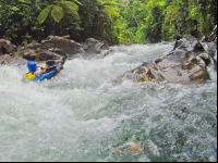        Kid Tubing In The Rapids Of The Blue River Rincon De La Vieja
  - Costa Rica