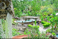       Los Lagos Hot Spring Sunbathing Area With Pool Viewed From The Waterslide
  - Costa Rica