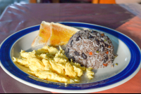        Gallo Pinto With Eggs And Bread Restaurante Carolina
  - Costa Rica