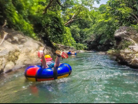        Tubing Face Down Rio Negro Tubing Rincon De La Vieja
  - Costa Rica