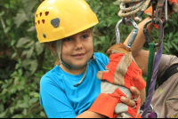        titi canopy tour girl 
  - Costa Rica