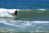        dominical beach attraction surf 
  - Costa Rica