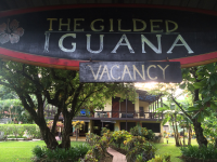        entrance sign gilded iguana
  - Costa Rica