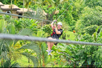        Flying Above The Resort Los Lagos On A Zip Line Los Canones Canopy Tour La Fortuna
  - Costa Rica