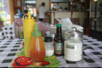        table condiments rosis soda tica 
  - Costa Rica