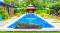        Blue Osa Budha Laid On Pool Edge
  - Costa Rica